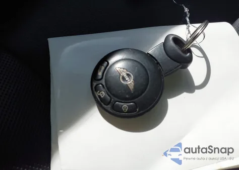 2012 Mini Cooper z USA, uszkodzony, nr VIN WMWZN3C59CT134684